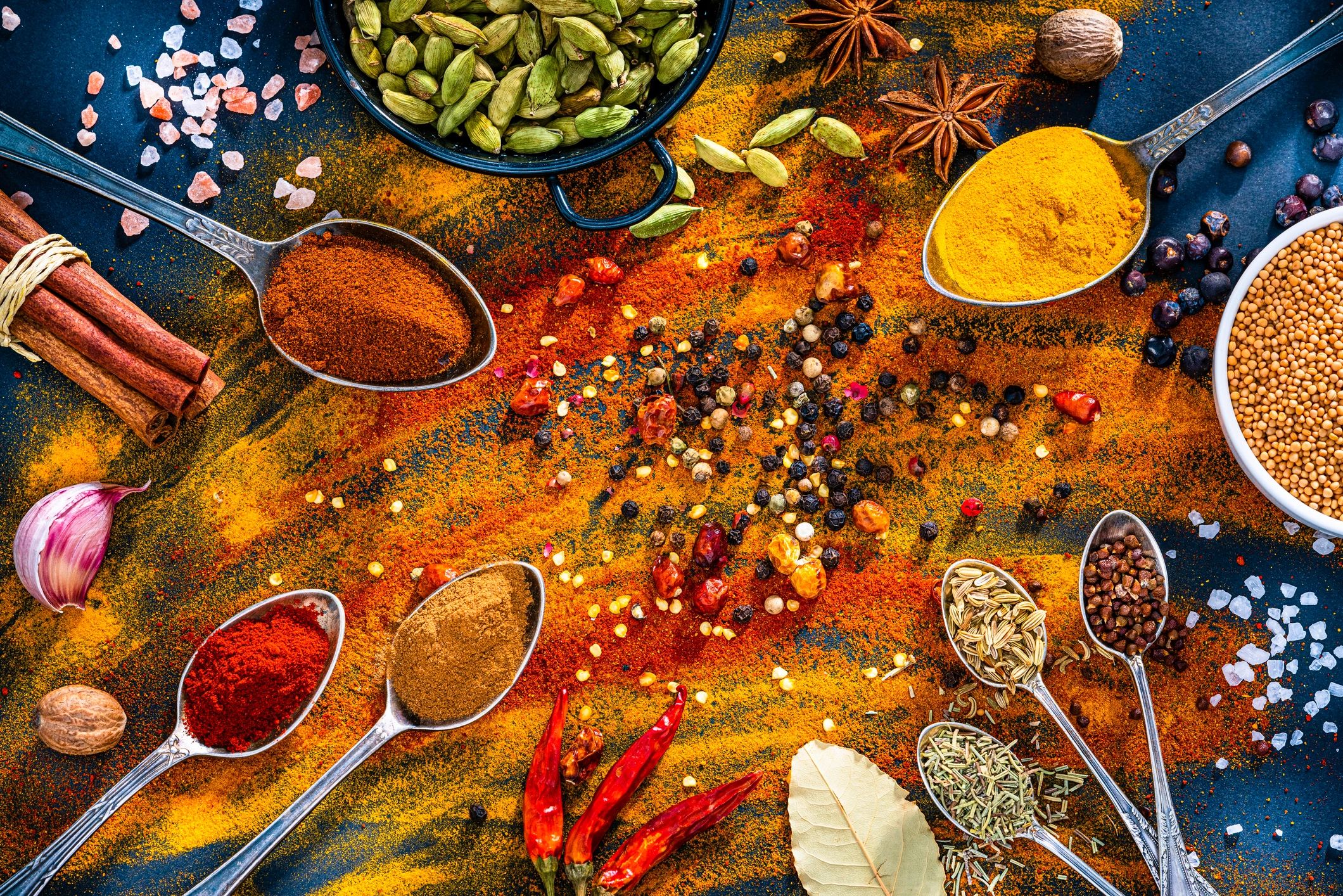Colorful spices and botanicals photographed from above